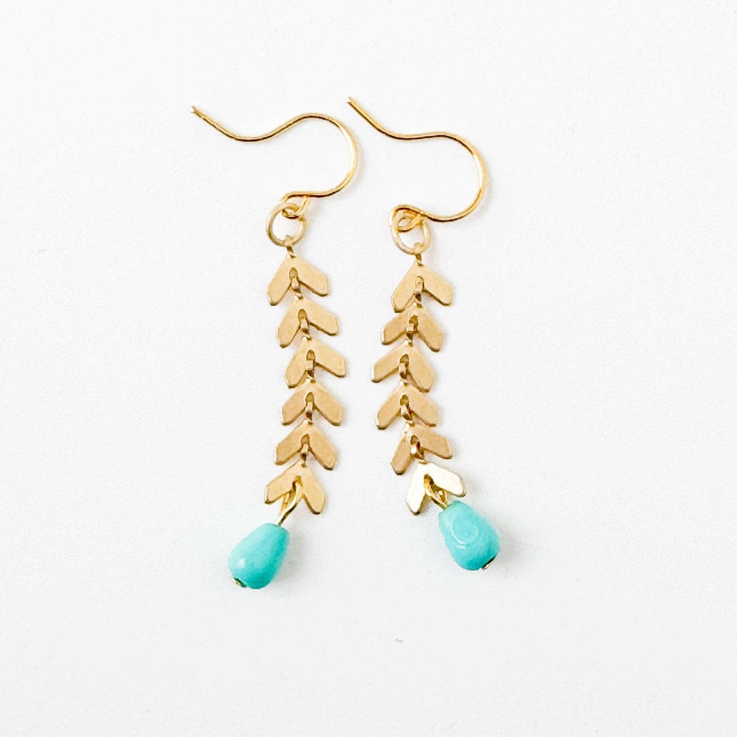 Gold Chevron Earrings With Turquoise Glass Beads.
