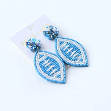 Load image into Gallery viewer, Beaded Carolina Blue Football Earrings| GAME DAY EARRINGS.
