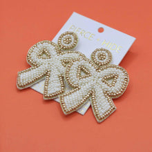 Load image into Gallery viewer, Cream Statement Bow Earrings.
