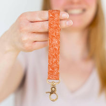 Load image into Gallery viewer, Terracotta Floral Wristlet Keychain.
