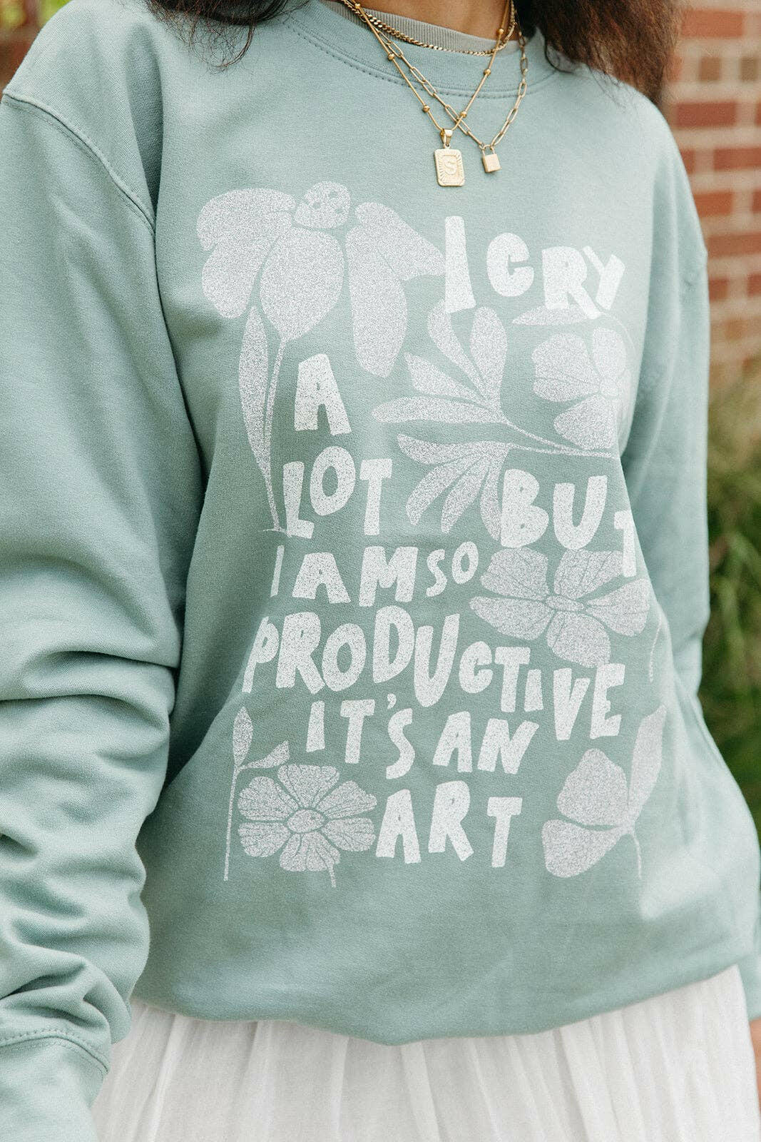 I Cry A Lot Sweatshirt In Dusty Green.