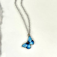 Load image into Gallery viewer, Blue Butterfly In Dolly We Trust Necklace
