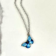 Load image into Gallery viewer, Blue Butterfly In Dolly We Trust Necklace.
