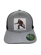 Load image into Gallery viewer, Sasquatch Trucker Mesh Snapback Hat: Brown on Khaki.
