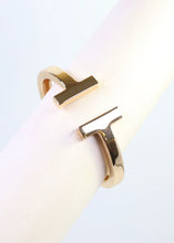 Load image into Gallery viewer, Jessi Open T Bangle Bracelet Gold
