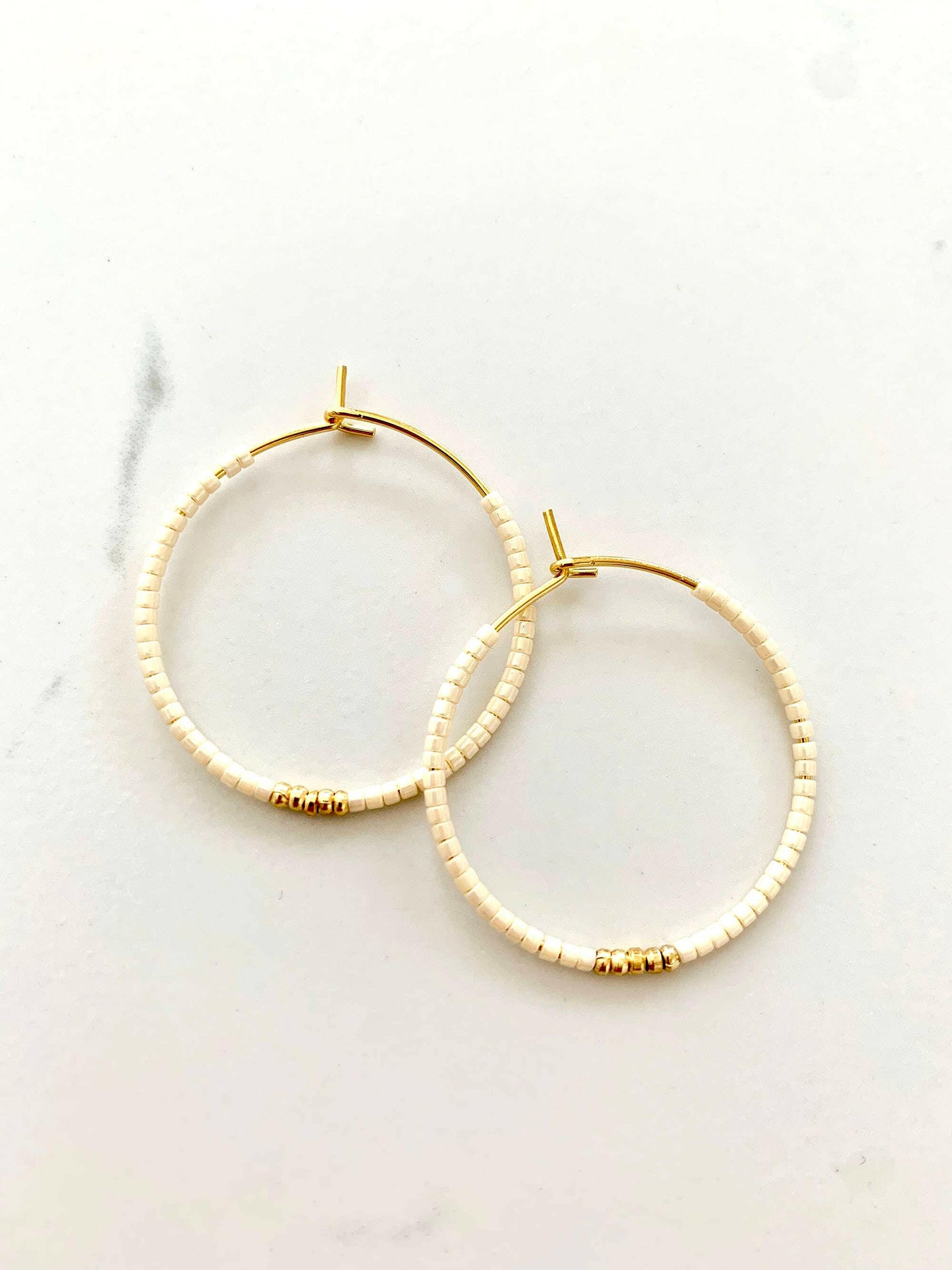 Cream and Gold Hoops.