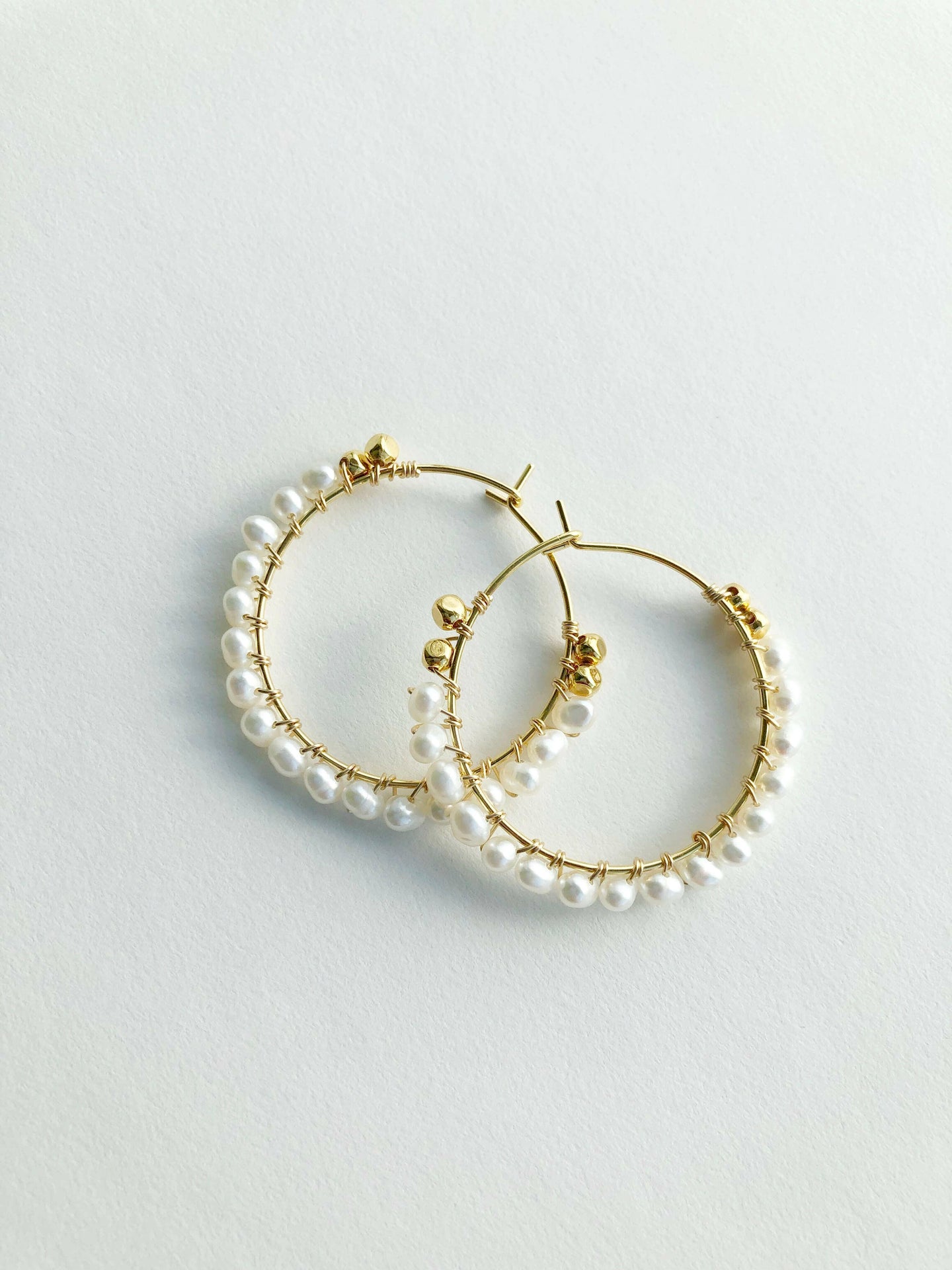 Pearl Wrap Hoop Earrings.