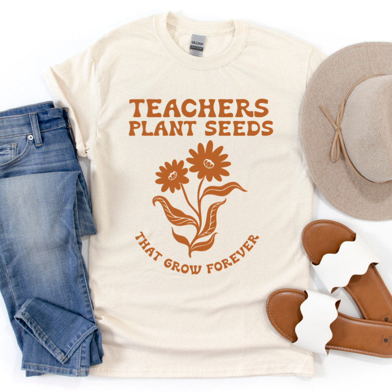 TEACHERS PLANT SEEDS FALL GRAPHIC TEE.