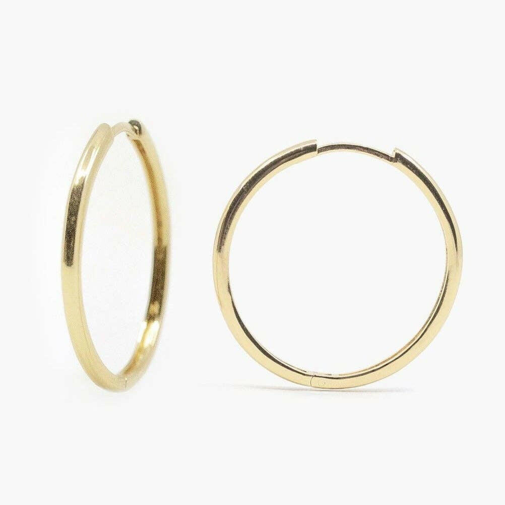 Large Hoop Earrings in Gold.