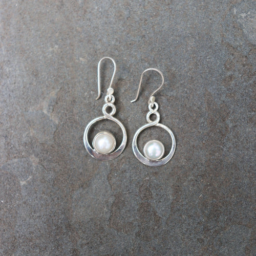 Pearl Earrings.