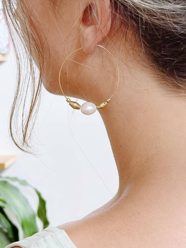 Pearl Earrings large pearl hoops.