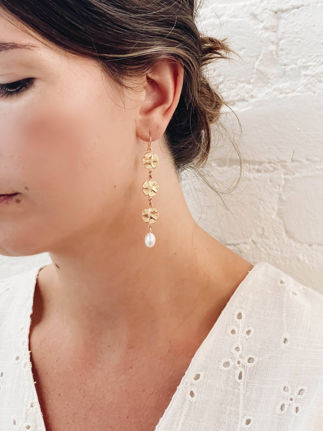 Pearl and three flowers dangle earrings