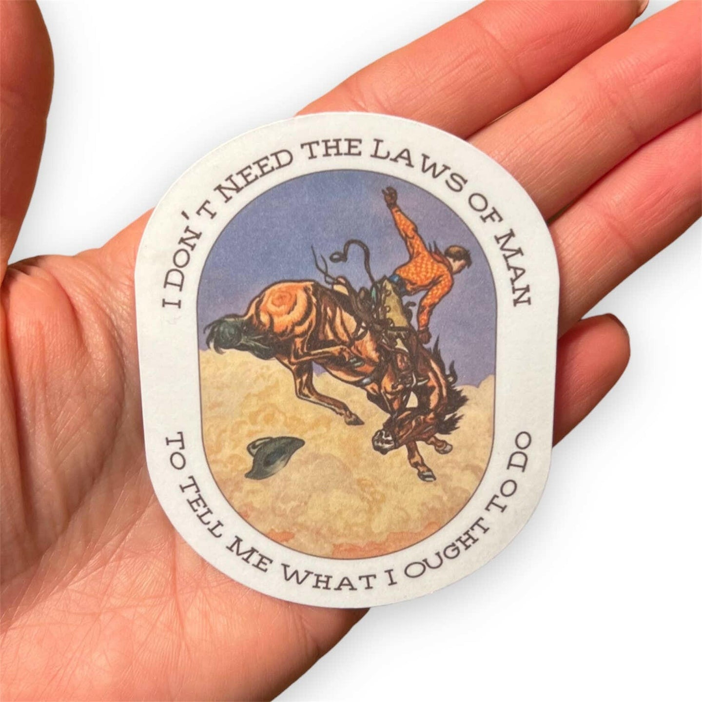 Laws of Man Cowboy Sticker.