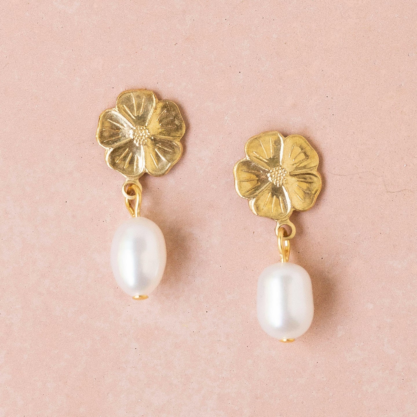 Flower and pearl studs.