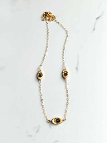 Garnet Eye Necklace.